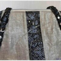 Le sac à main en cuir texturé python et lin lamé