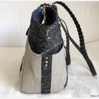 Le sac à main en cuir texturé python et lin lamé